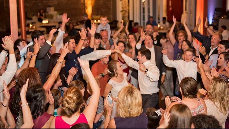 Guests celebrating on the open floor at the depot